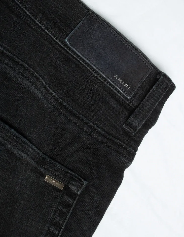black distressed jeans